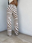 Spodnie SIMPLE print zebra - beżowa