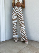 Spodnie SIMPLE print zebra - beżowa