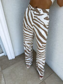 Spodnie SIMPLE print zebra - beżowa