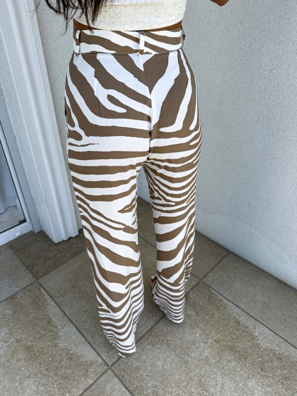 Spodnie SIMPLE print zebra - beżowa