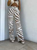 Spodnie SIMPLE print zebra - beżowa